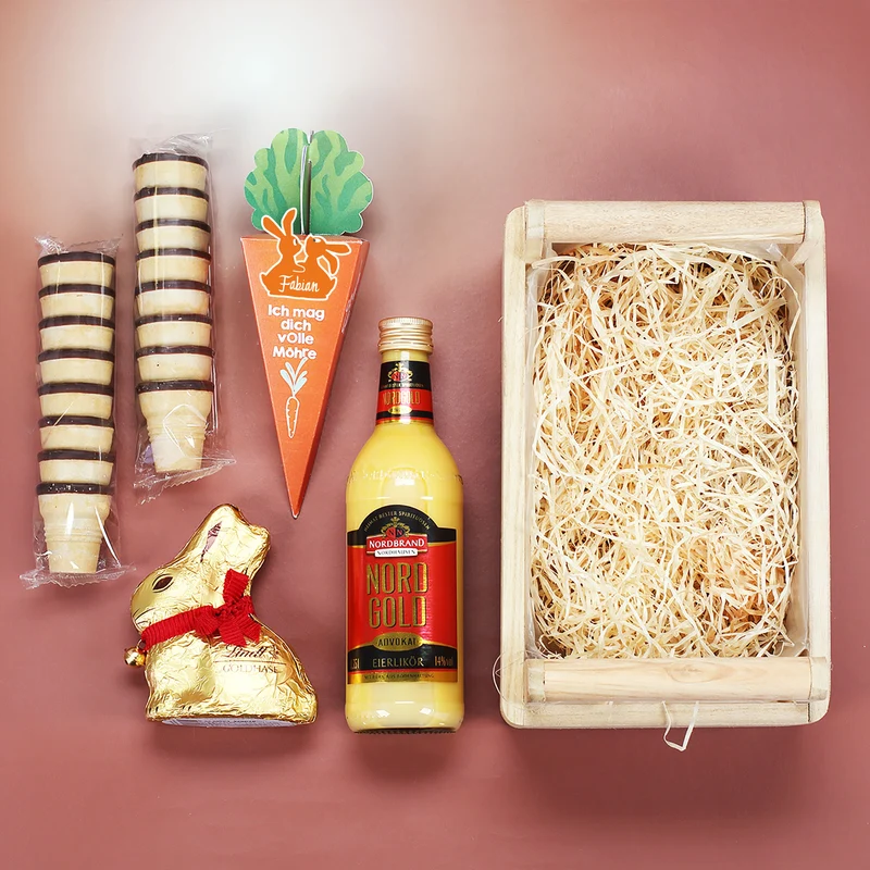 Oster Geschenkset im Holzkorb 'Frohe Ostern' mit personalisierter Möhre, Eierlikör & Lindt Schokolade