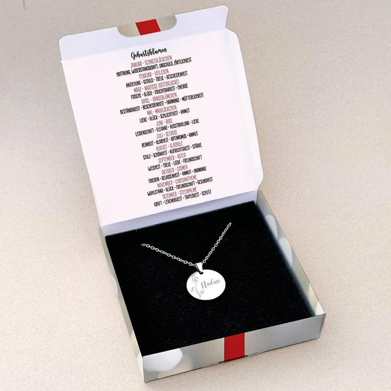 Geburtsblumen-Halskette mit Name graviert in weihnachtlicher Geschenkbox