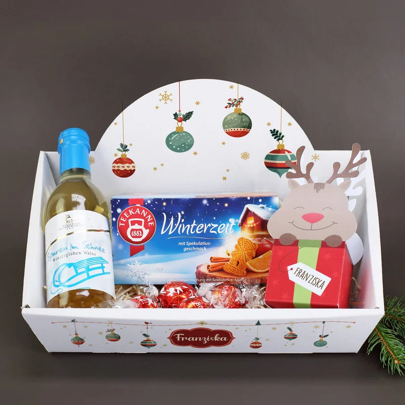 Geschenkkorb mit Lindorkugeln, Tee und Glühwein zu Weihnachten