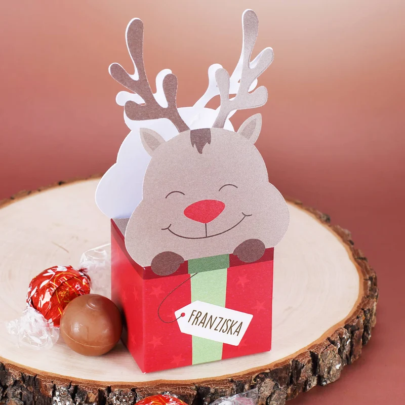 Geschenkkorb mit Lindorkugeln, Tee und Glühwein zu Weihnachten