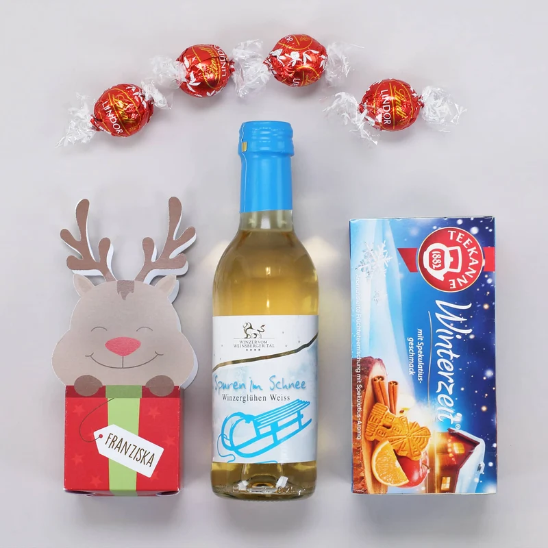 Geschenkkorb mit Lindorkugeln, Tee und Glühwein zu Weihnachten