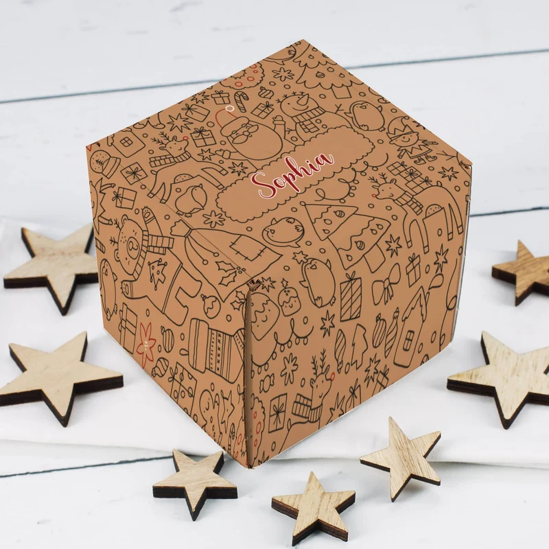 Geschenkset mit weihnachtlichen Doodle als Motiv, eine personalisierte Tasse und ein kleiner Stollen