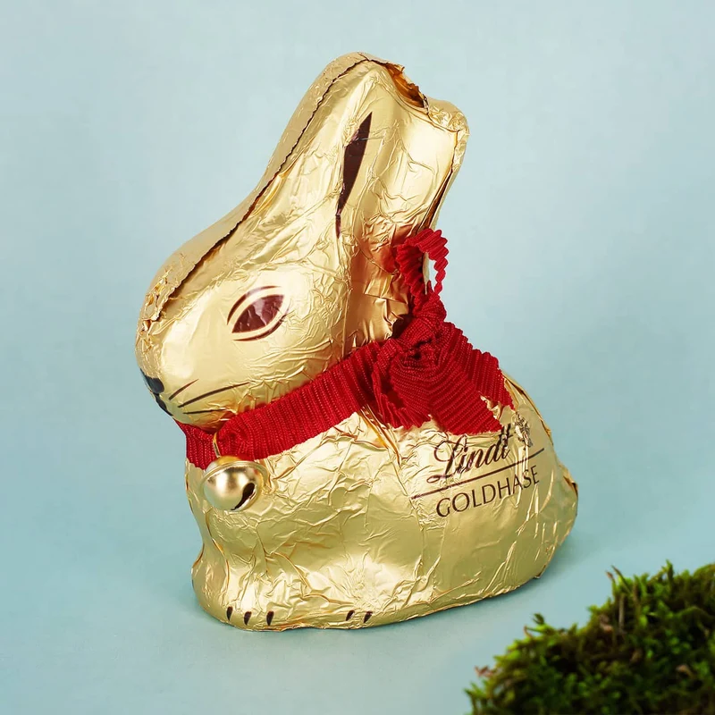 Frohe Ostern - Tasse mit Hasen, Blumen, Name - gefüllt mit Lindt Schokoherzen