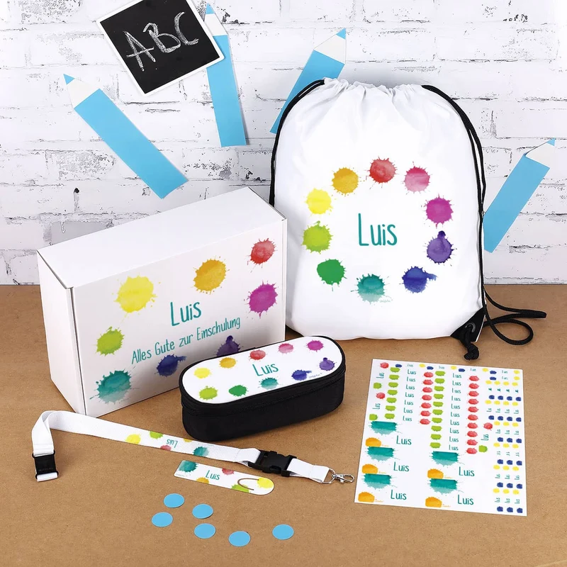 Geschenkset zur Einschulung mit buntem Motiv und Namensaufdruck