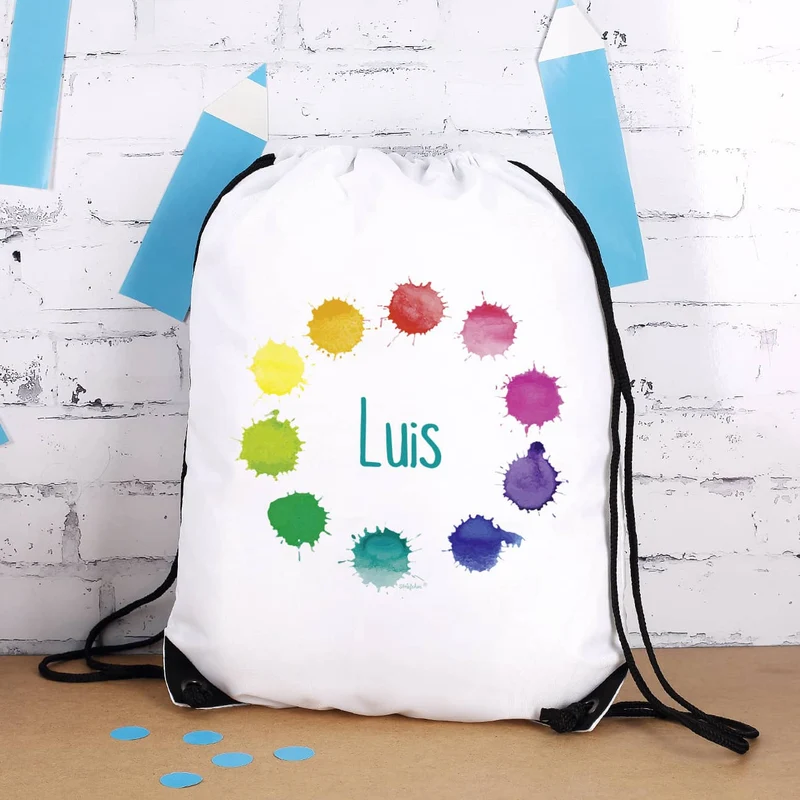 Geschenkset zur Einschulung mit buntem Motiv und Namensaufdruck