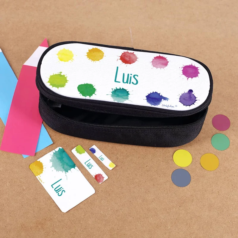 Geschenkset zur Einschulung mit buntem Motiv und Namensaufdruck