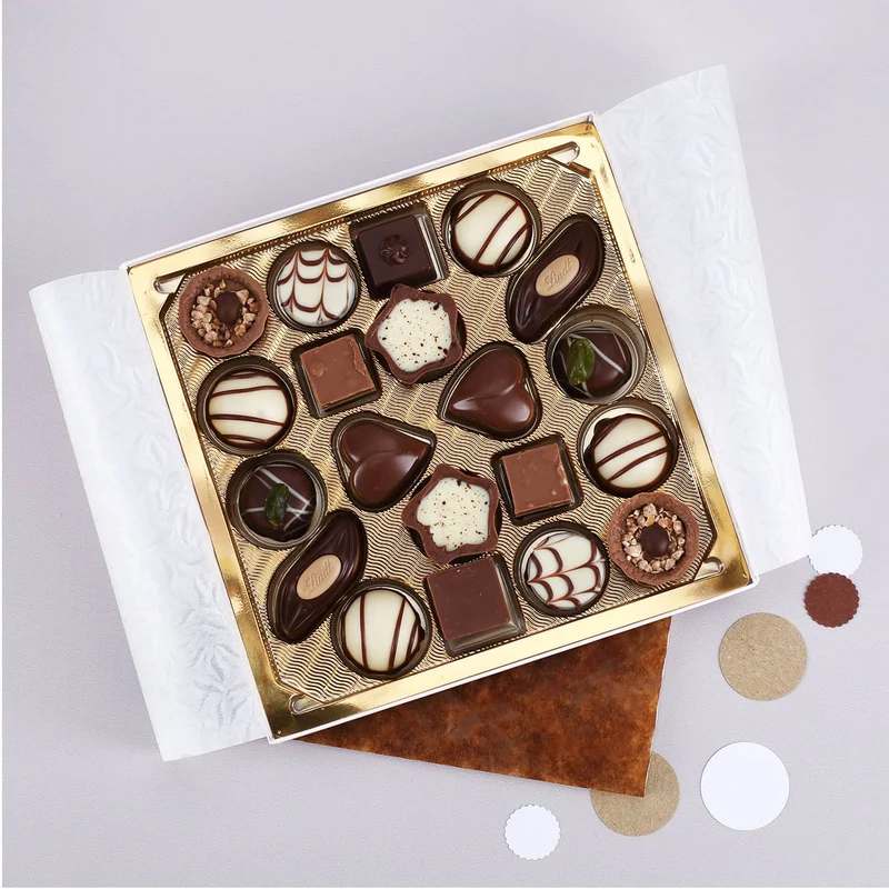 Geschenkset zu Weihnachten mit Lindt Pralinen und Wein in Geschenkbox