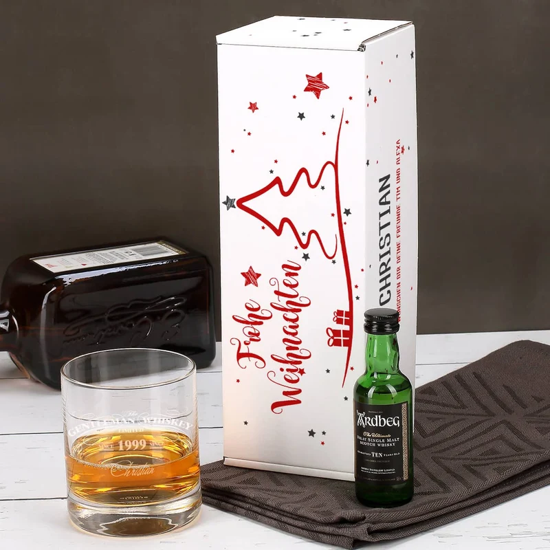 weihnachtliche Pappbox mit Ardbeg Mini Flasche und graviertem Whiskyglas