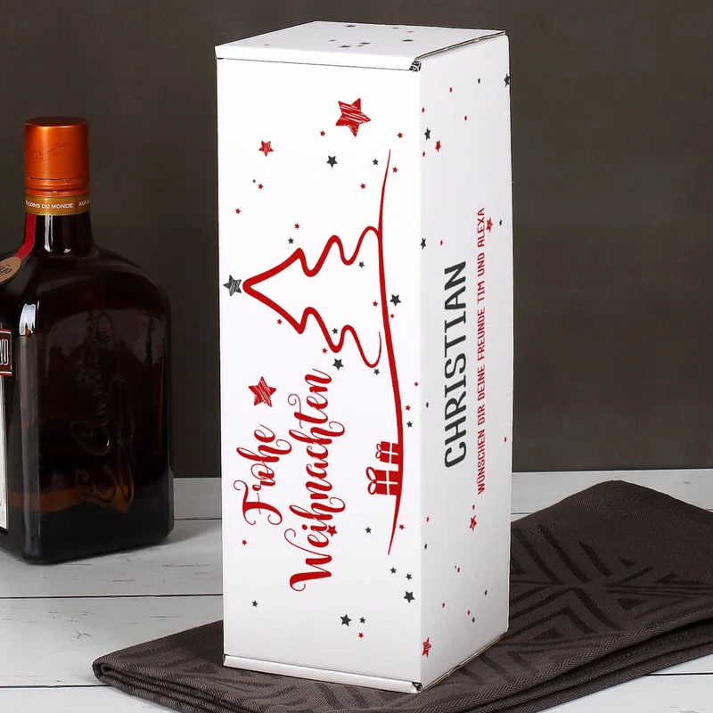 weihnachtliche Pappbox mit Ardbeg Mini Flasche und graviertem Whiskyglas